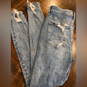Woman’s American Eagle Outfitters Blue Relaxed Jeans Distressed Style